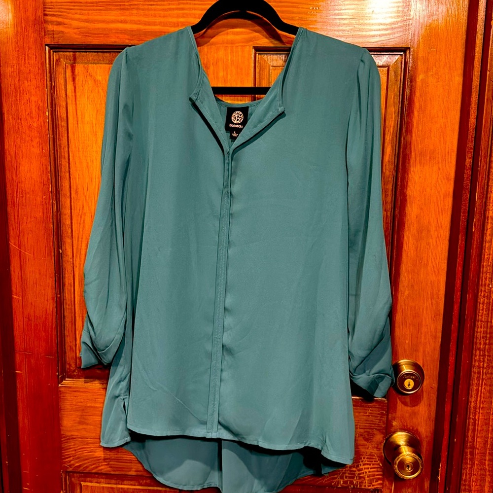 Green tunic style with long of quarter length sleeves